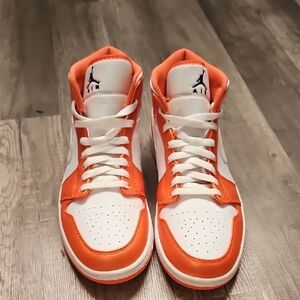 Nike Air Jordan 1 Mid White and Orange Basketball Sneakers